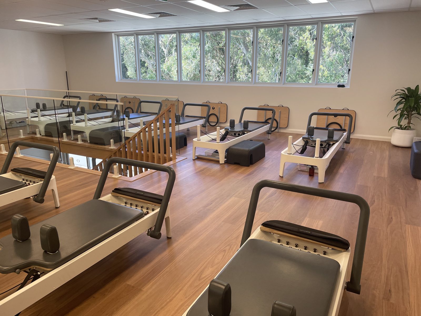 Reformers set up in the Ocean Studio Pilates studio